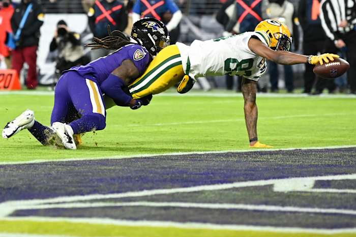 Dec 19, 2021; Baltimore, Maryland, USA; Green Bay Packers wide receiver Marquez Valdes-Scantling (83)] divers for a touchdown during the second half \HG\ at M&T Bank Stadium. Mandatory Credit: Tommy Gilligan-USA TODAY Sports